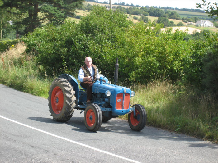 ../Images/Fr. Murphy Vintage Tractor Run 2006--36.JPG